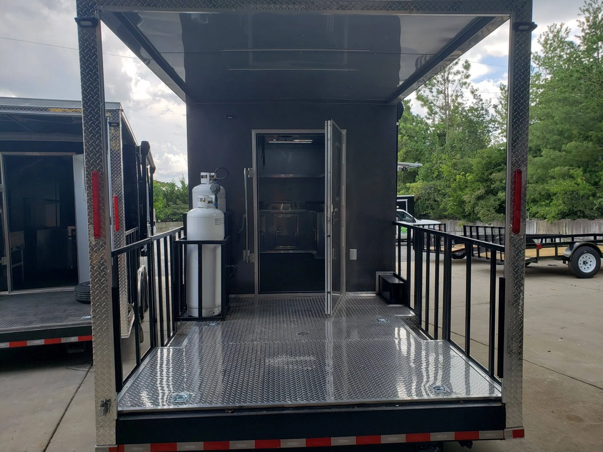 846-8.5-x-28-charcoal-gray-porch-style-concession-trailer-with-restroom-16.webp 8.5' x 28' Charcoal Gray Porch Style Concession Trailer with Restroom