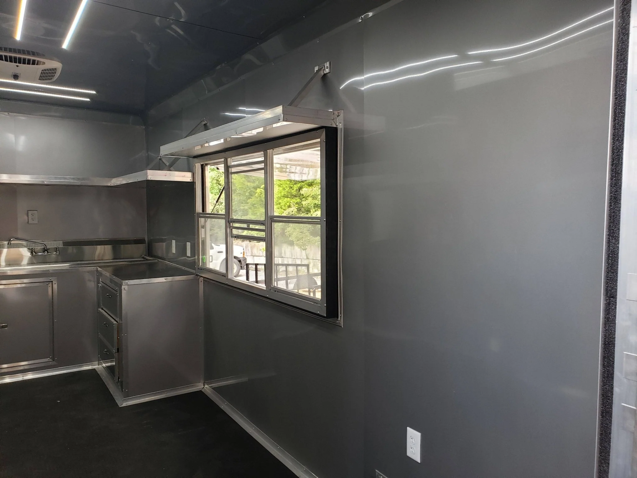 846-8.5-x-28-charcoal-gray-porch-style-concession-trailer-with-restroom-20.webp 8.5' x 28' Charcoal Gray Porch Style Concession Trailer with Restroom