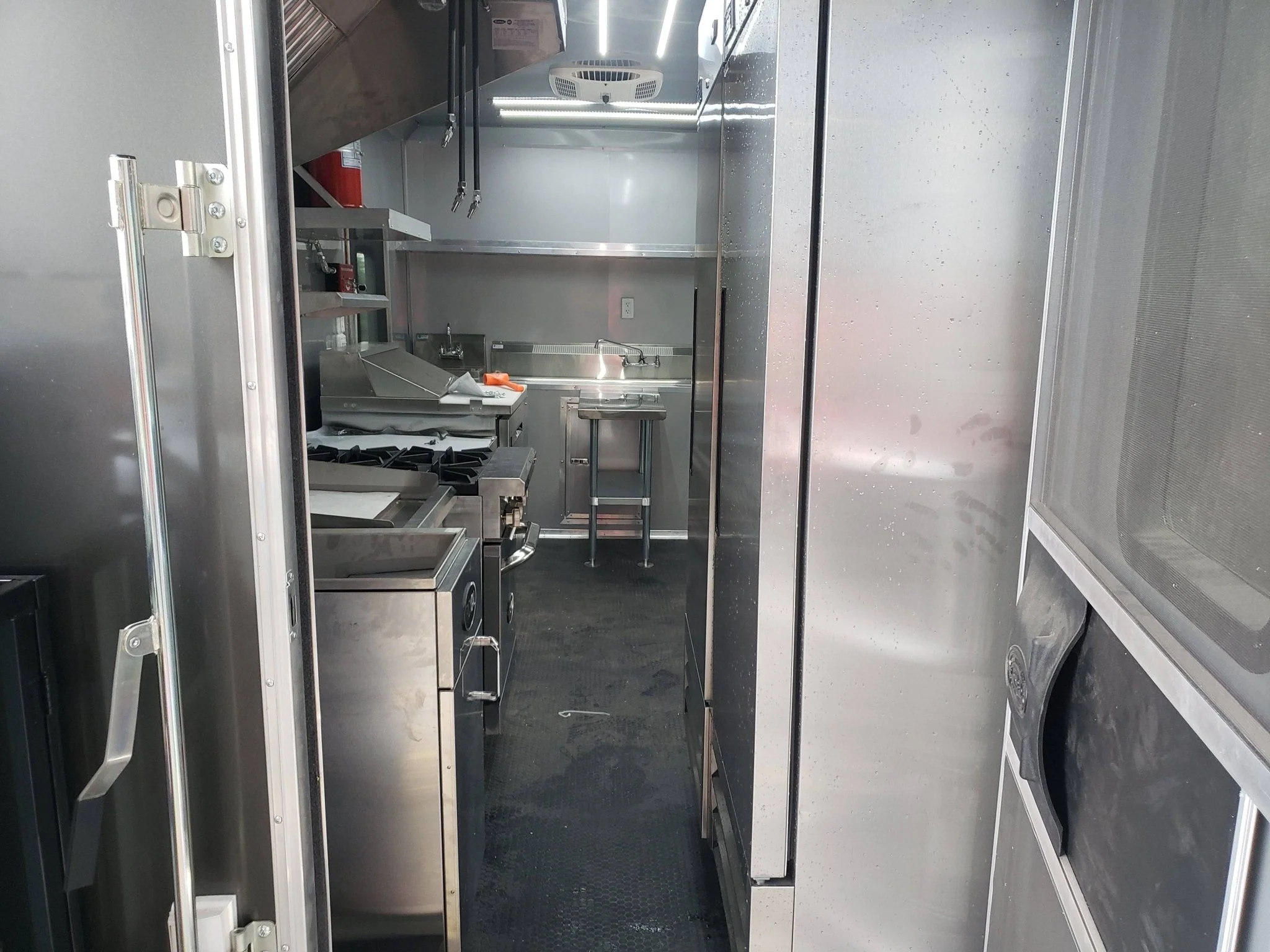 846-8.5-x-28-charcoal-gray-porch-style-concession-trailer-with-restroom-5.webp 8.5' x 28' Charcoal Gray Porch Style Concession Trailer with Restroom