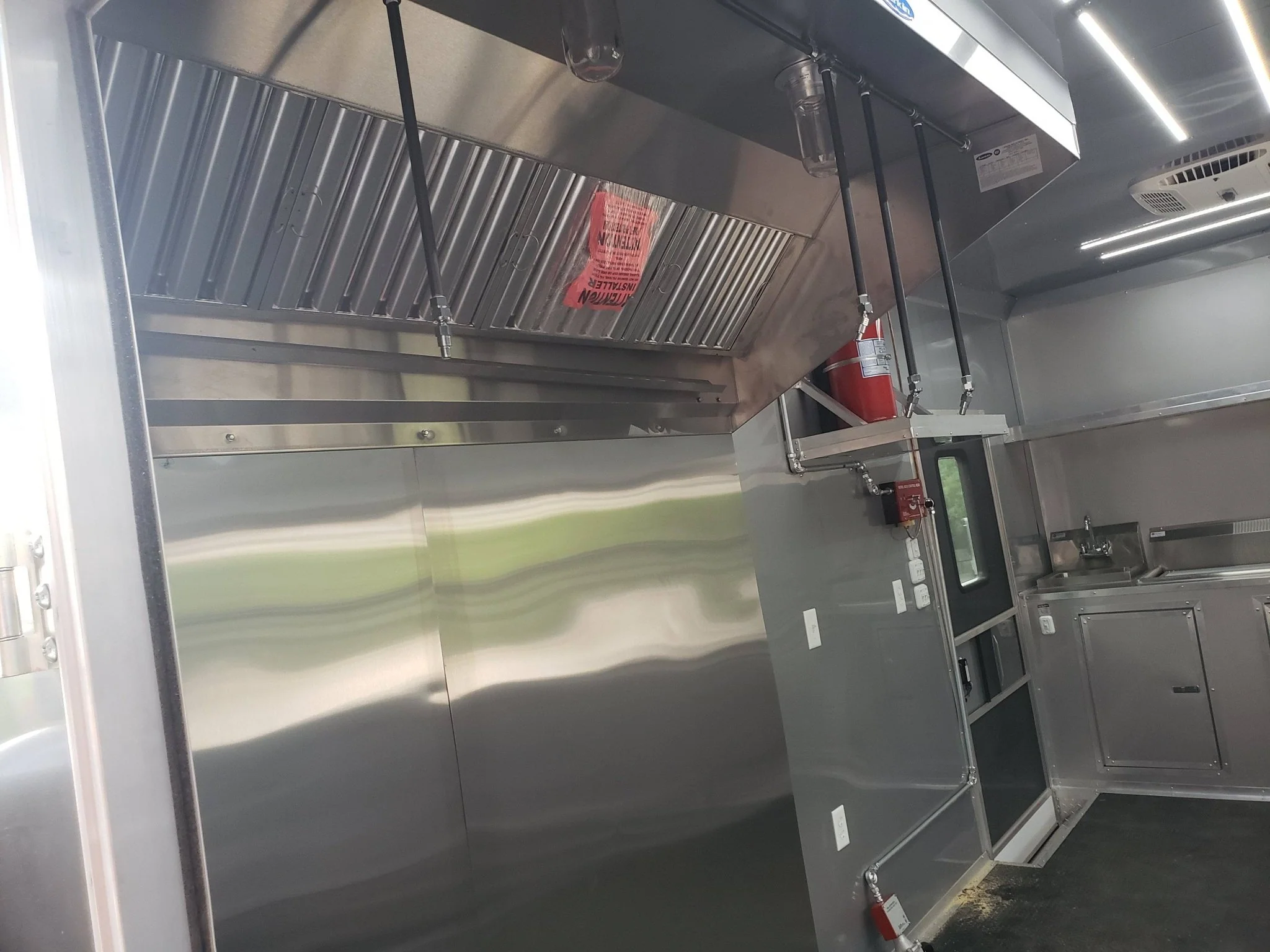 846-8.5-x-28-charcoal-gray-porch-style-concession-trailer-with-restroom-9.webp 8.5' x 28' Charcoal Gray Porch Style Concession Trailer with Restroom