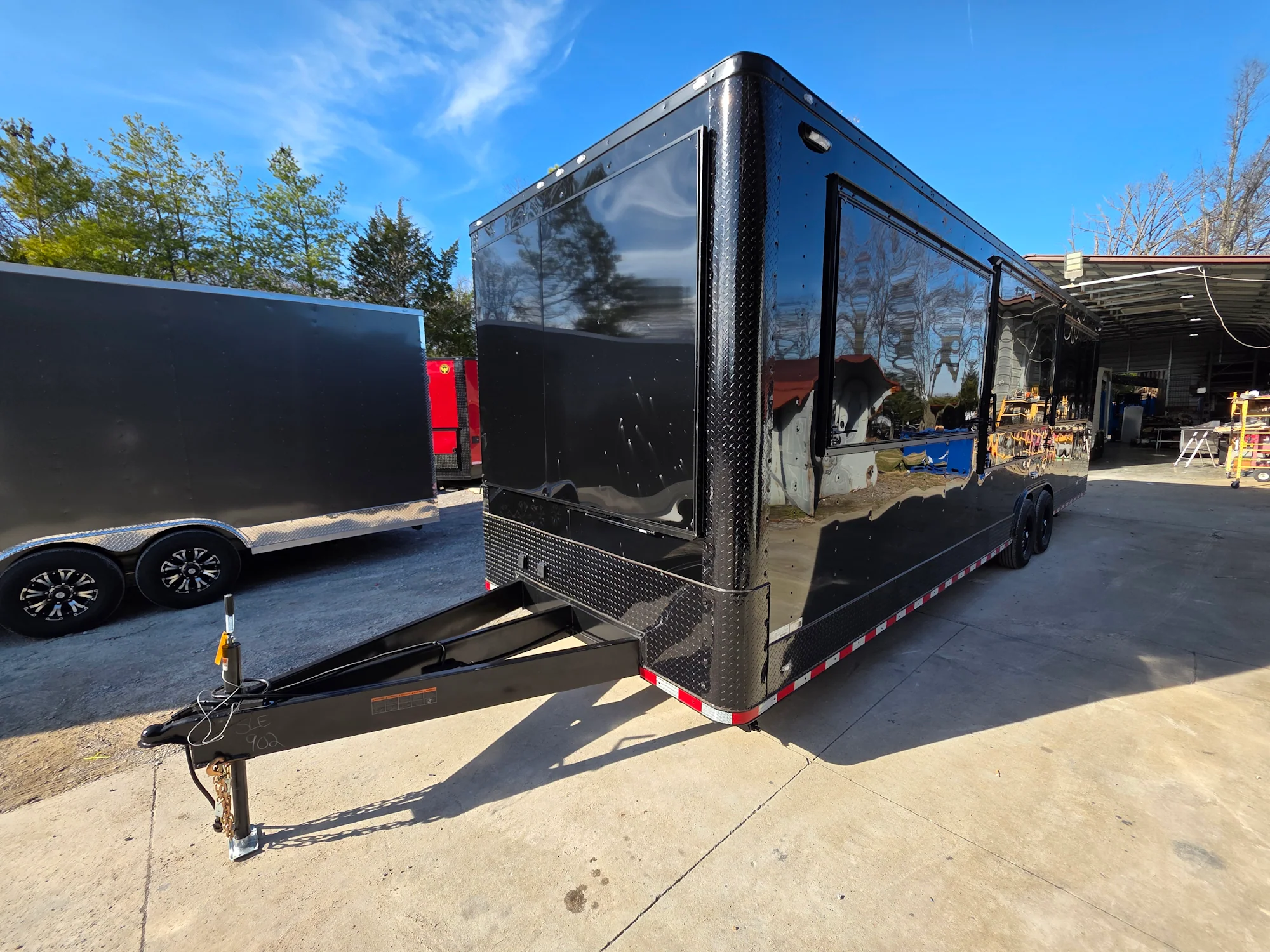 904-8.5-x-30-custom-advertising-trailer-with-black-out-package-4.webp 8.5' X 30' Custom Advertising Trailer With Black Out Package