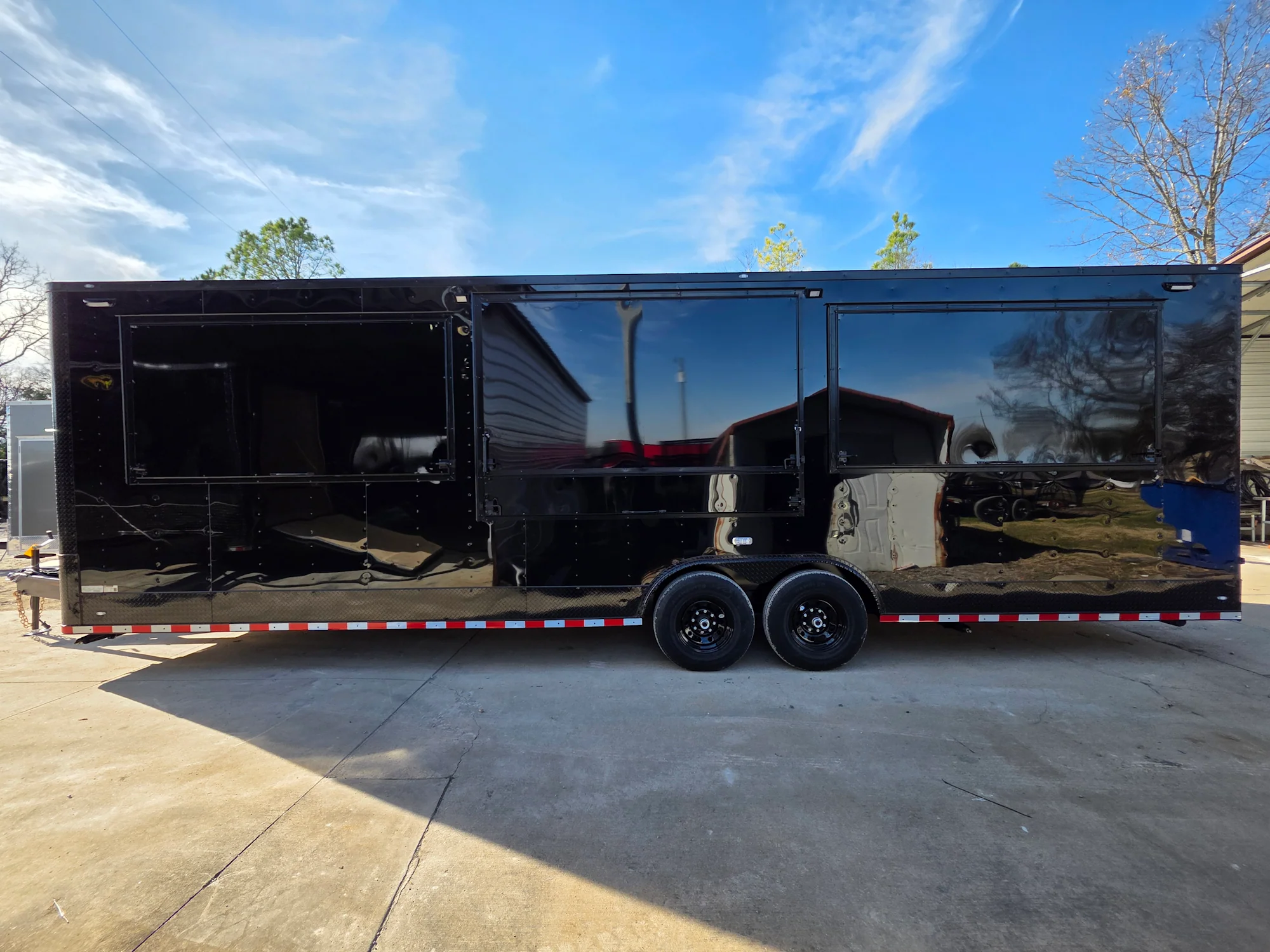904-8.5-x-30-custom-advertising-trailer-with-black-out-package-5.webp 8.5' X 30' Custom Advertising Trailer With Black Out Package