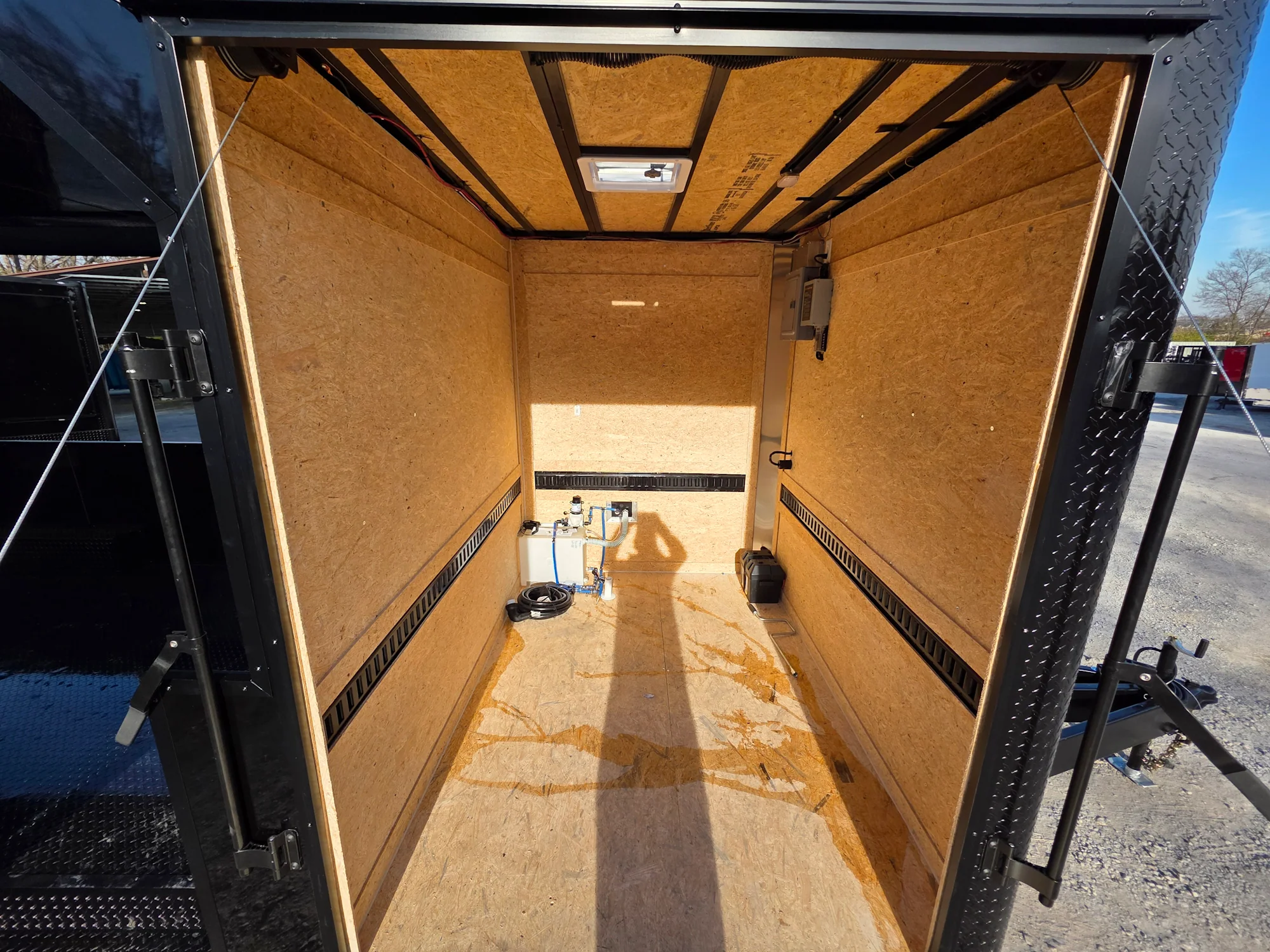 8.5' X 30' Custom Black With Blackout Tailgate Trailer