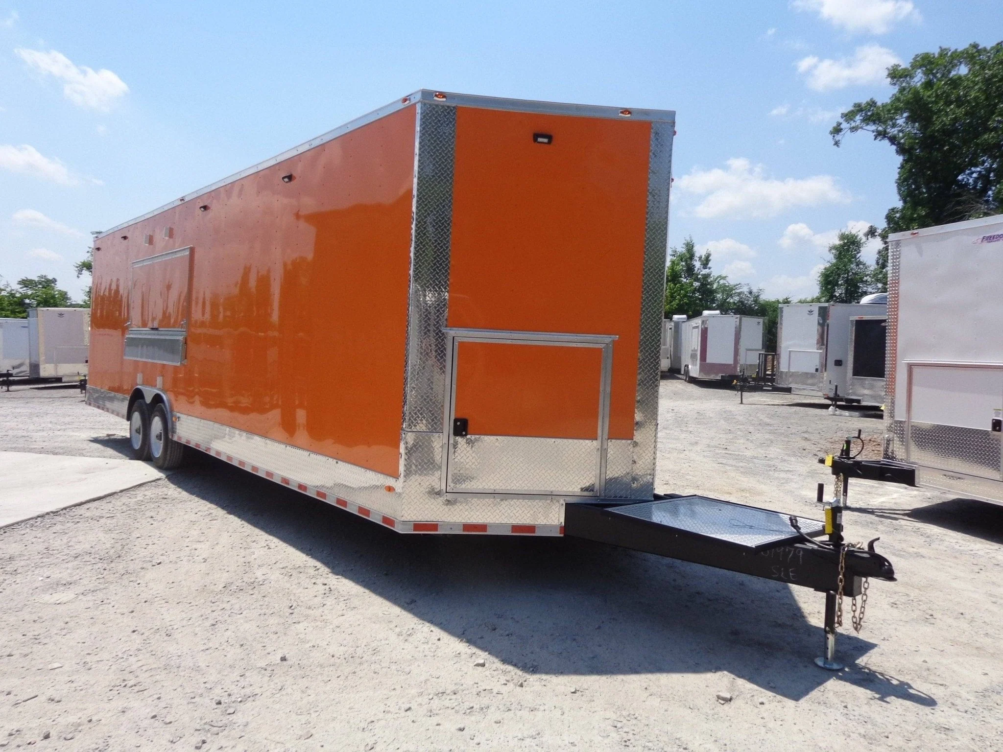 918-8.5-x-30-orange-v-nose-concession-food-trailer-4.webp 8.5' X 30' Orange V-Nose Concession Food Trailer