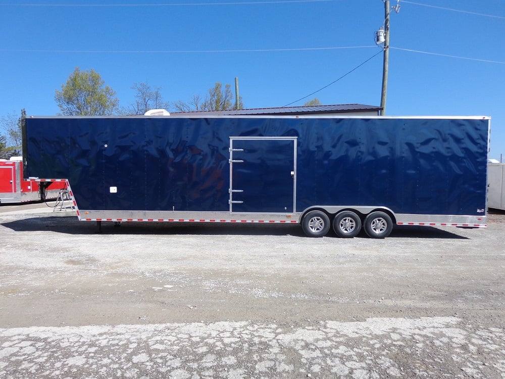 983-8.5-x-45-indigo-blue-enclosed-gooseneck-event-trailer-2.jpg 8.5' x 45' Indigo Blue Enclosed Gooseneck Event Trailer
