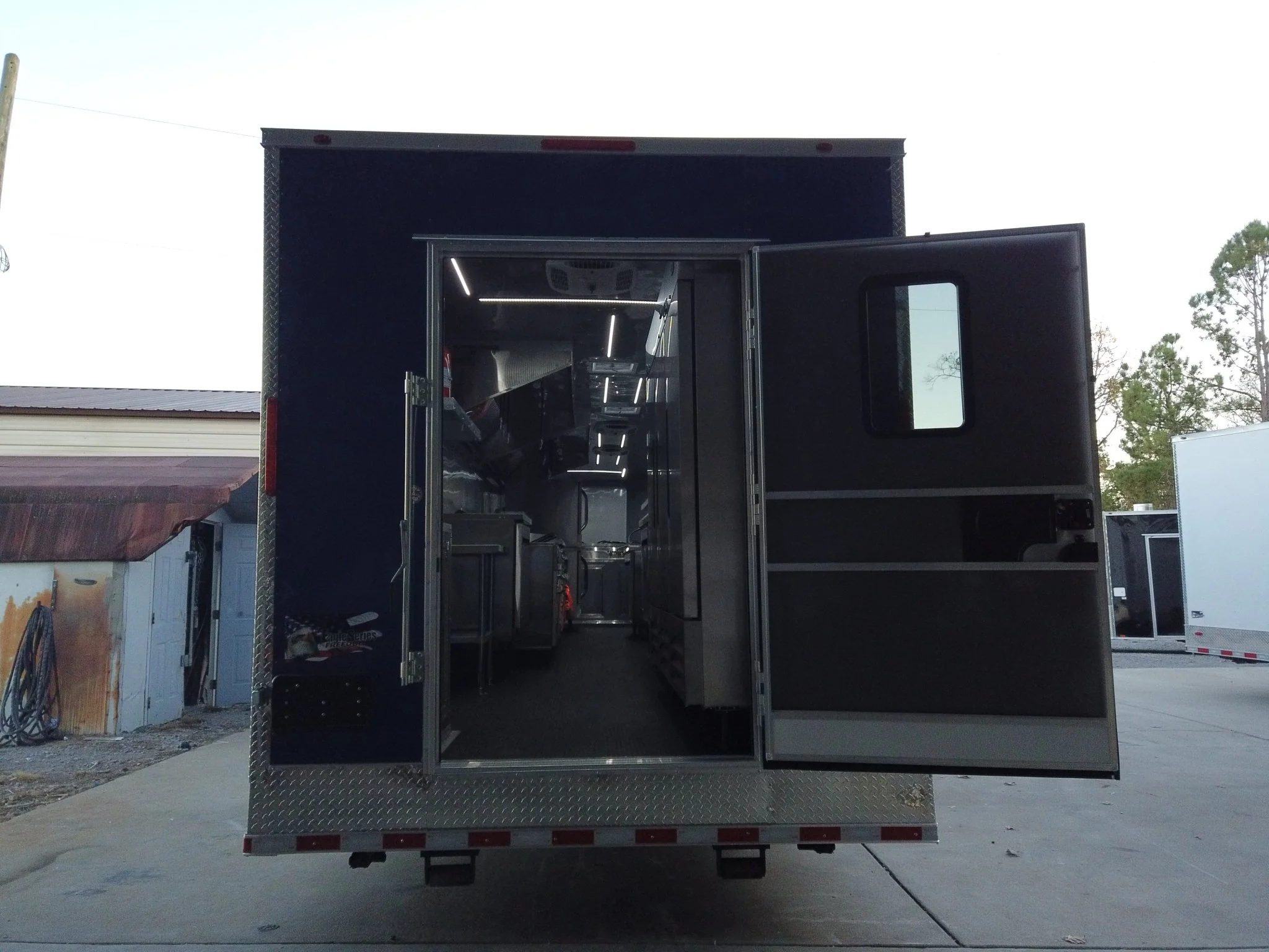 987-8.5-x-46-cobalt-blue-gooseneck-concession-trailer-without-appliances-8.webp 8.5' x 46' Cobalt Blue Gooseneck Concession Trailer (Without Appliances)